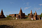 The cluster of red brick temples, named Khay-min-gha on the map on the North plain of Bagan. Myanmar. 